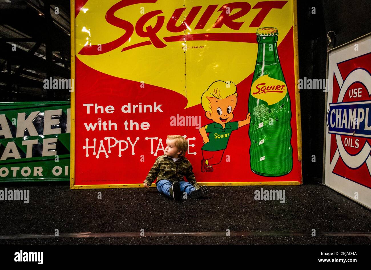Jonny Konti, 1, sits under an antique Squirt soda sign as his parents take his picture during opening day of Barrett-Jackson in Scottsdale on Saturday, Jan. 11, 2020. Barrett Jackson 23 (Photo by Eli Imadali/Arizona Republic/Imagn/USA Today Network/Sipa USA) Stock Photo