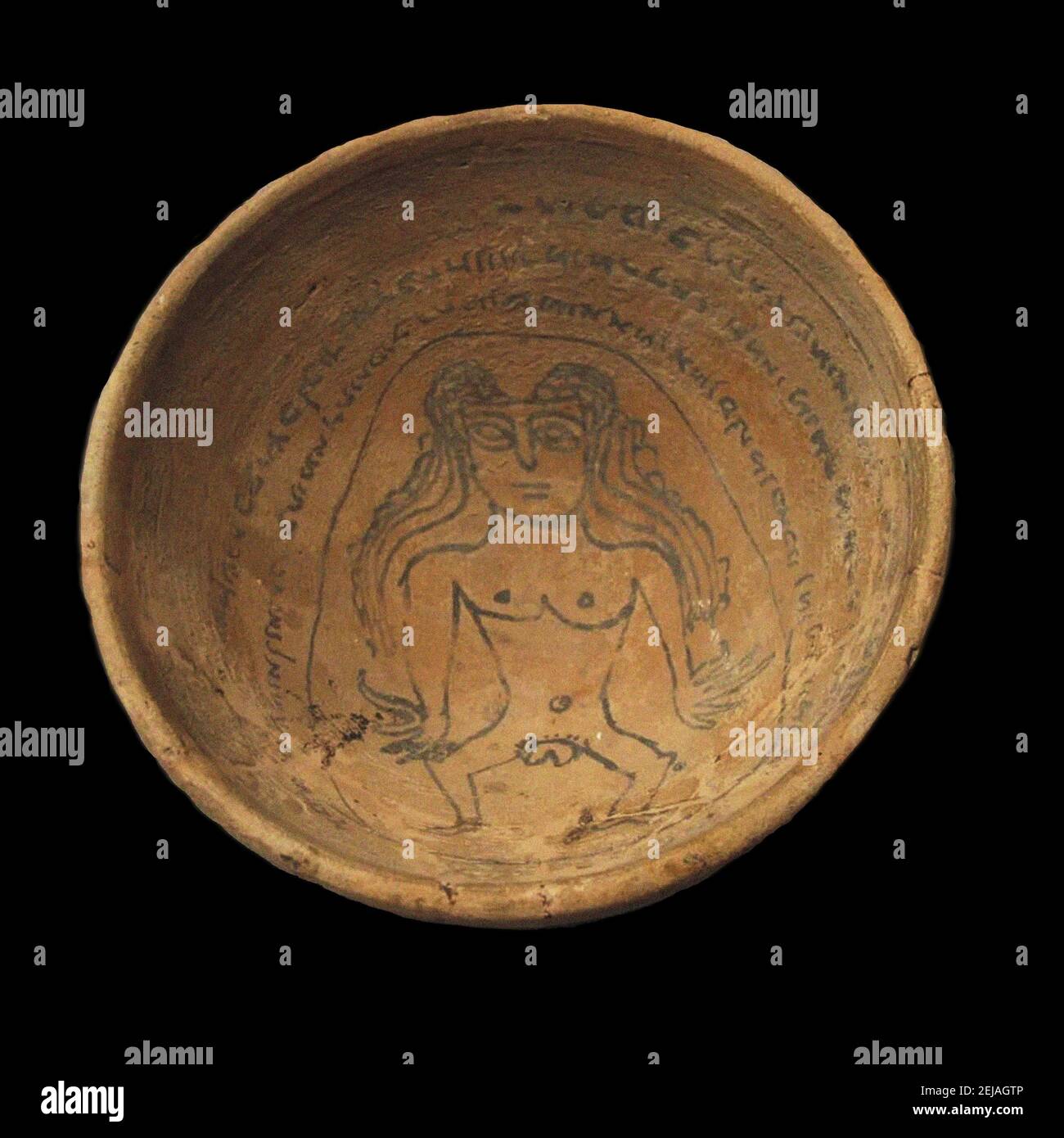 Magic bowl with an incantation text in Judeo-Aramaic and an image of the demon Lilith. Museum: Musée de la Castre, Cannes. Author: Sassanian Art. Stock Photo