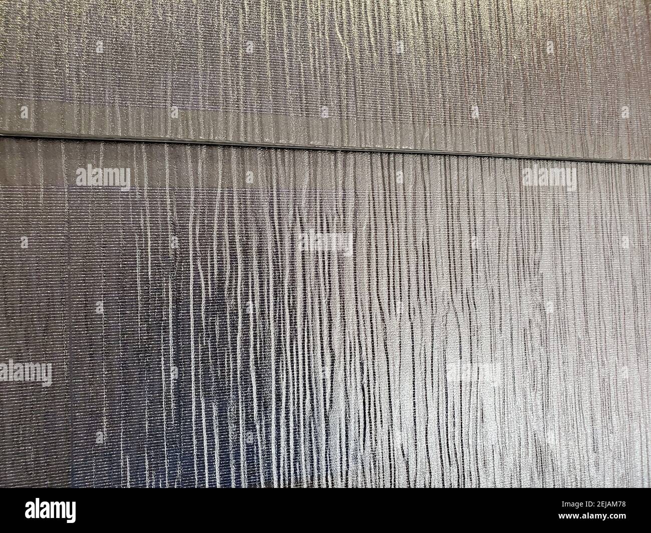 Detail view of Tesla Solarglass, a solar panel system integrated into