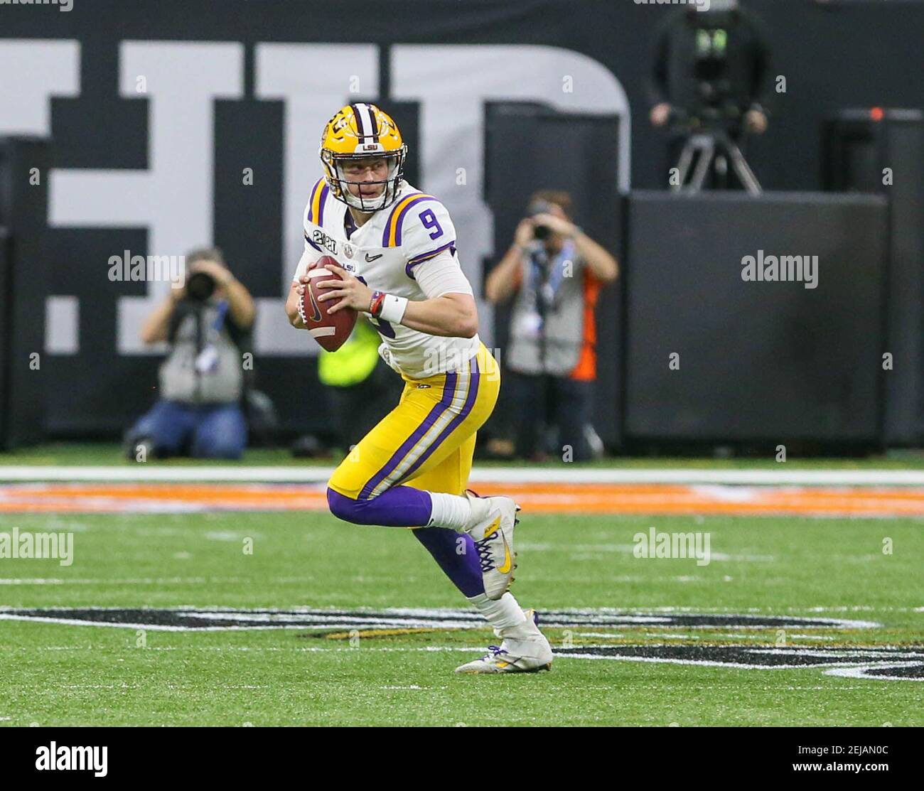 January 13, 2020 LSU quarterback Joe Burrow (9) rolls out of the pocket during the College