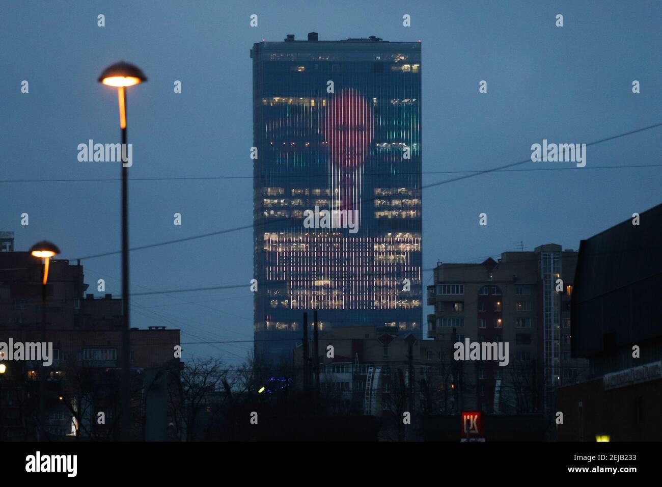 A giant Portrait of Vladimir Putin is seen on biggest media facade in