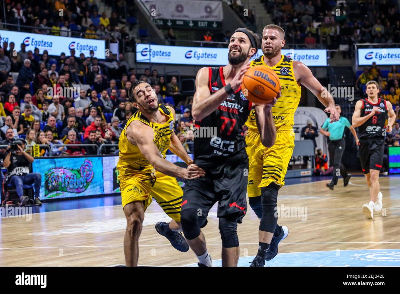 Vojtech Hruban, #77 of Cez Nymburk and Alex Lopez, #25 of Iberostar  Tenerife in action during the 2019/2020 Basketball Champions League Regular  Season Round 11 game between Iberostar Tenerife and Cez Nymburk