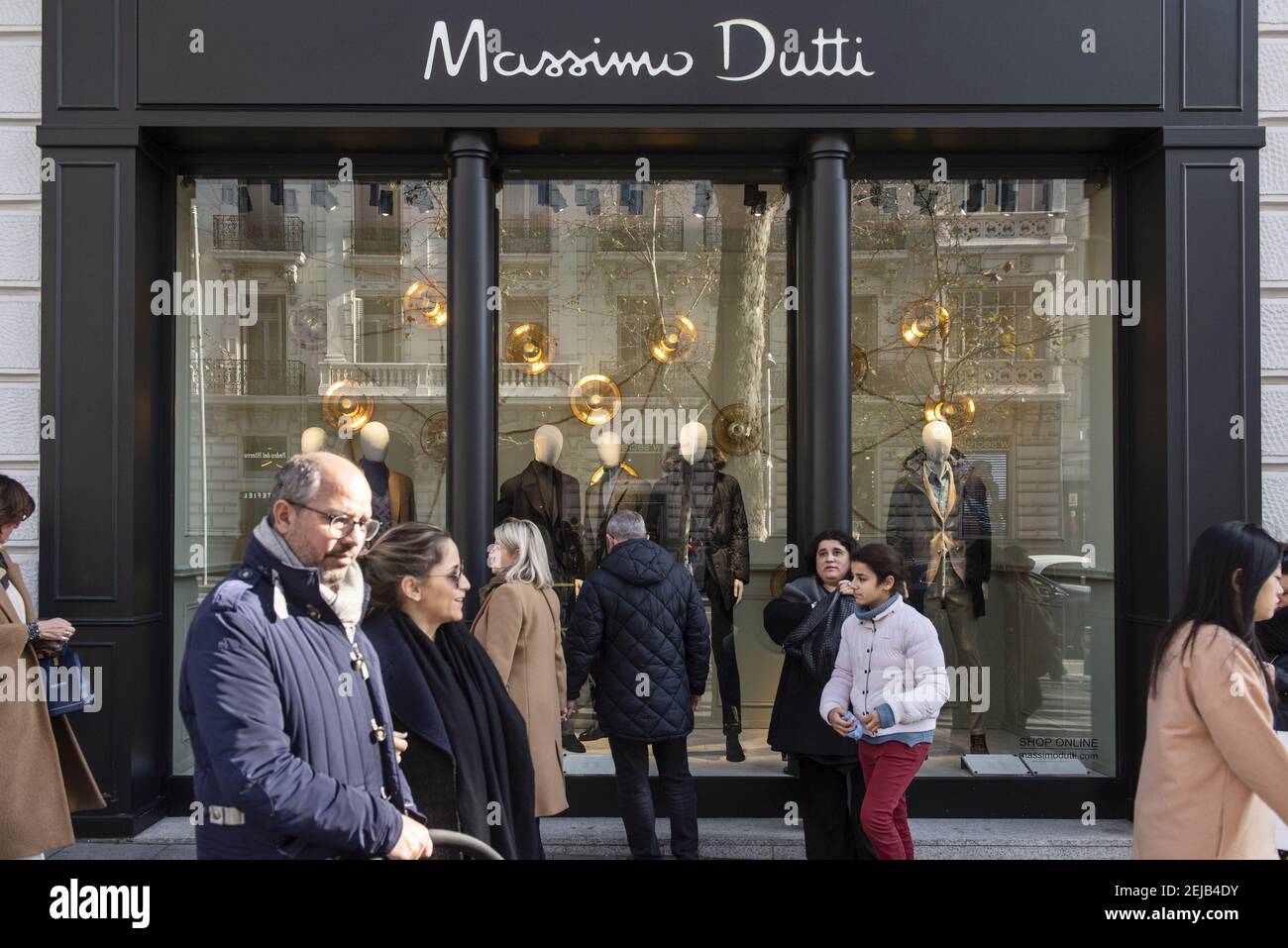 Pedestrians are seen walking past a Spanish clothing manufacturing and  brand Massimo Dutti seen in Spain. (Photo by Budrul Chukrut / SOPA  Images/Sipa USA Stock Photo - Alamy