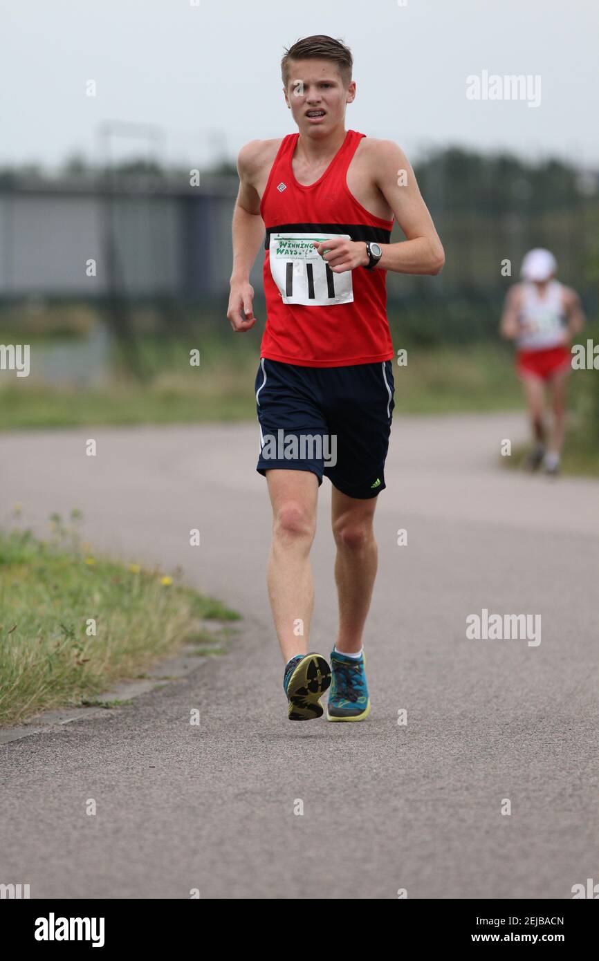 Cameron Corbishley aged 15 completing in a race walk event Stock Photo