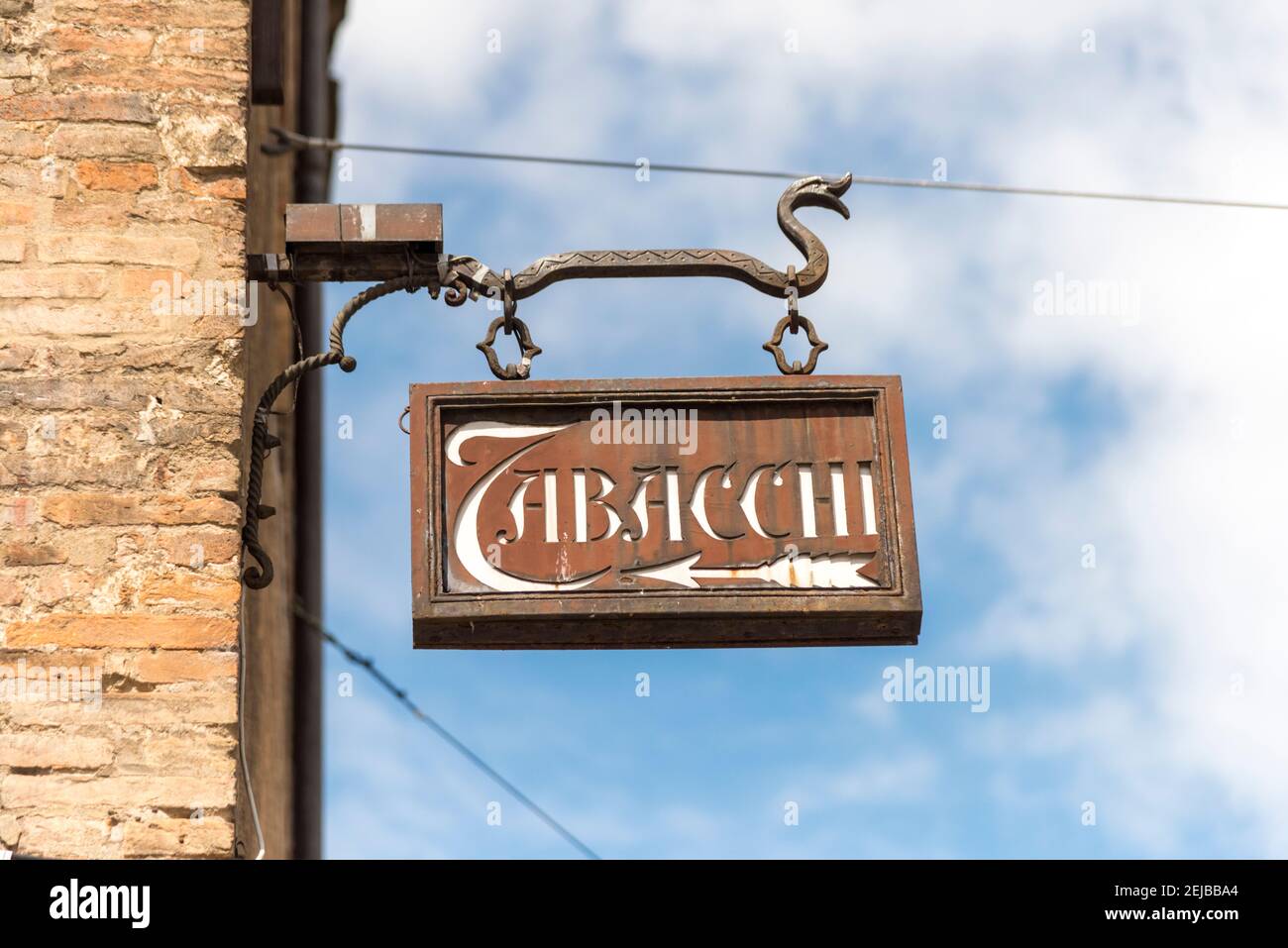 A old sign for a tobacconists shop on a wall in Bologna Italy Stock Photo