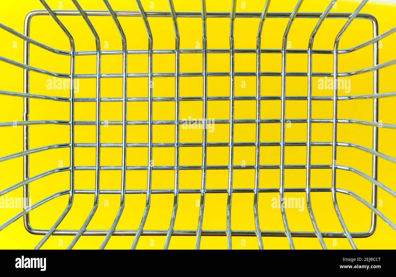 Abstract background of metal mesh on a yellow background Stock Photo