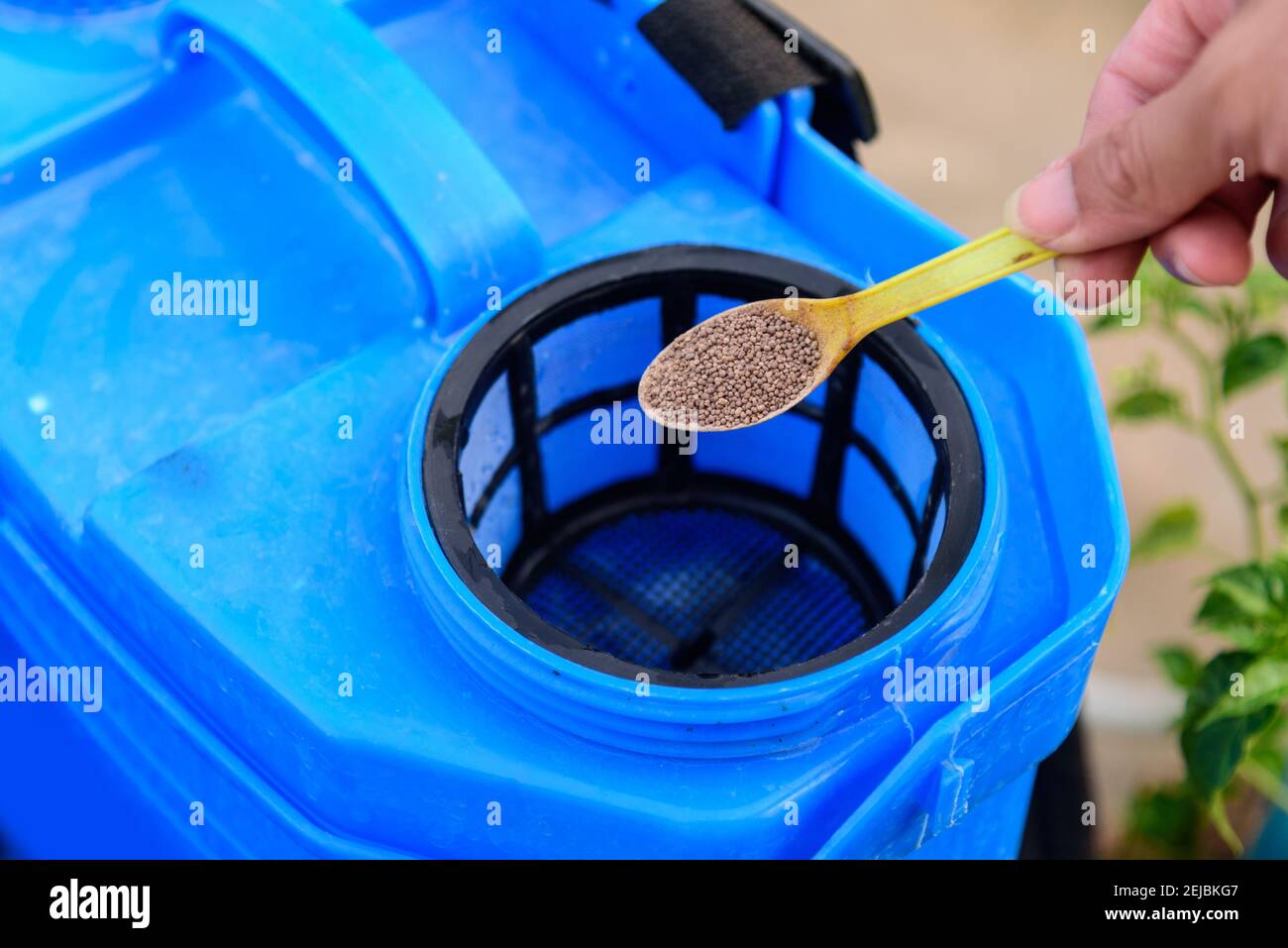 add the Insecticide and water in to the spray tank for spraying in farm ...