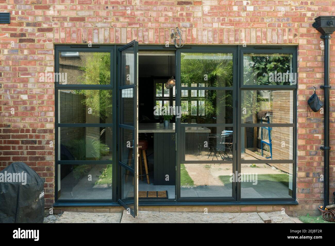 Very smart modern double glazed black framed patio doors Stock Photo