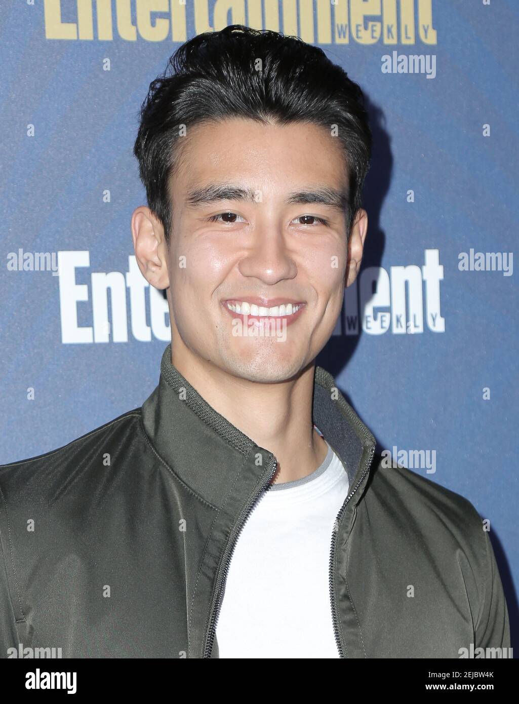 Alex Landi walking the red carpet at Entertainment Weekly’s Official