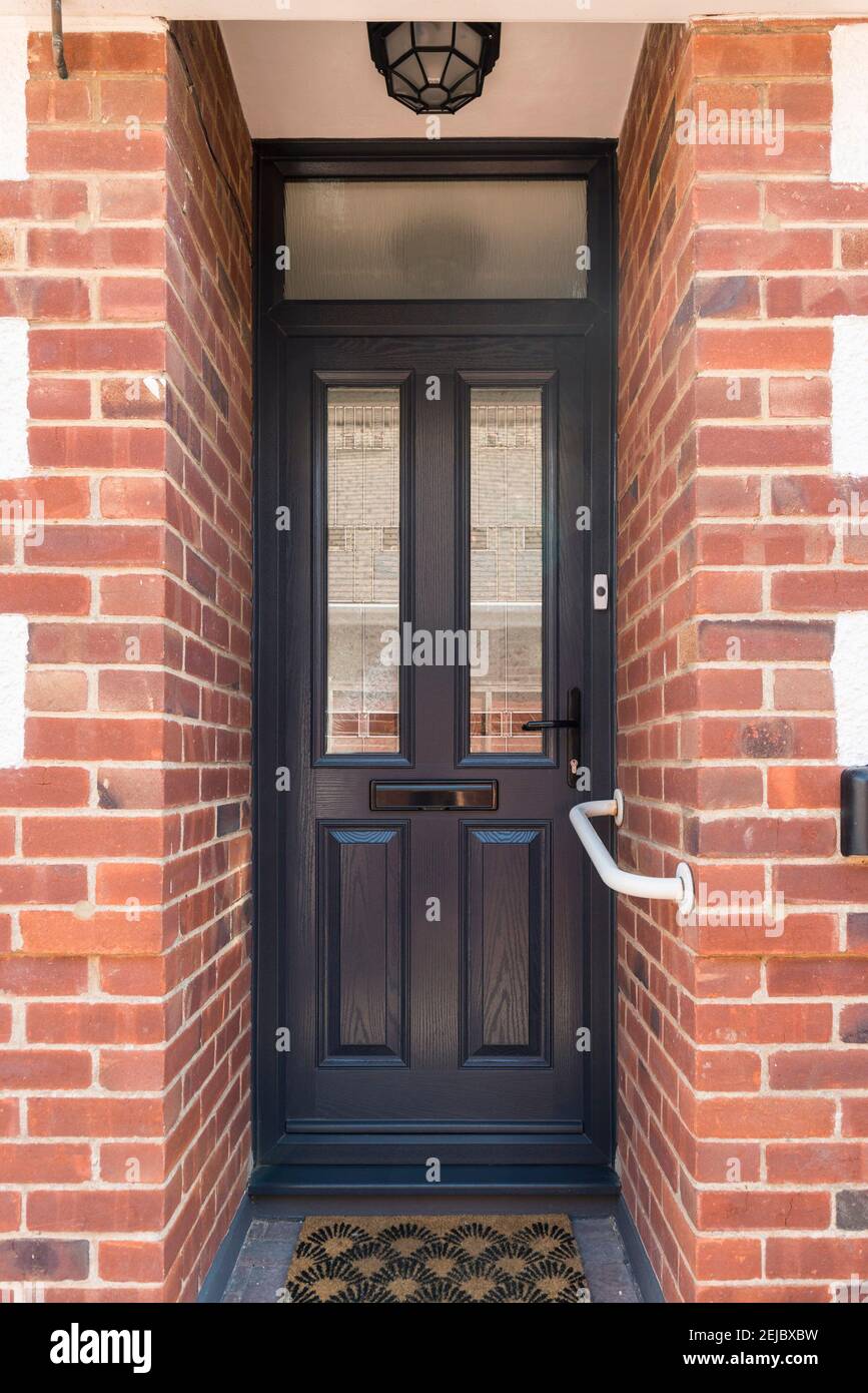 A modern double glazed front door on a residential home Stock Photo - Alamy