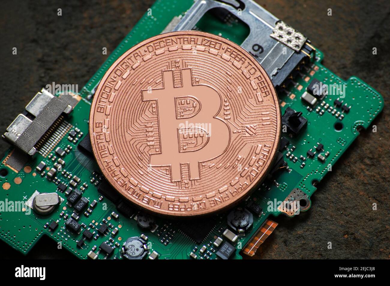 bitcoin logo coin on computer parts Stock Photo