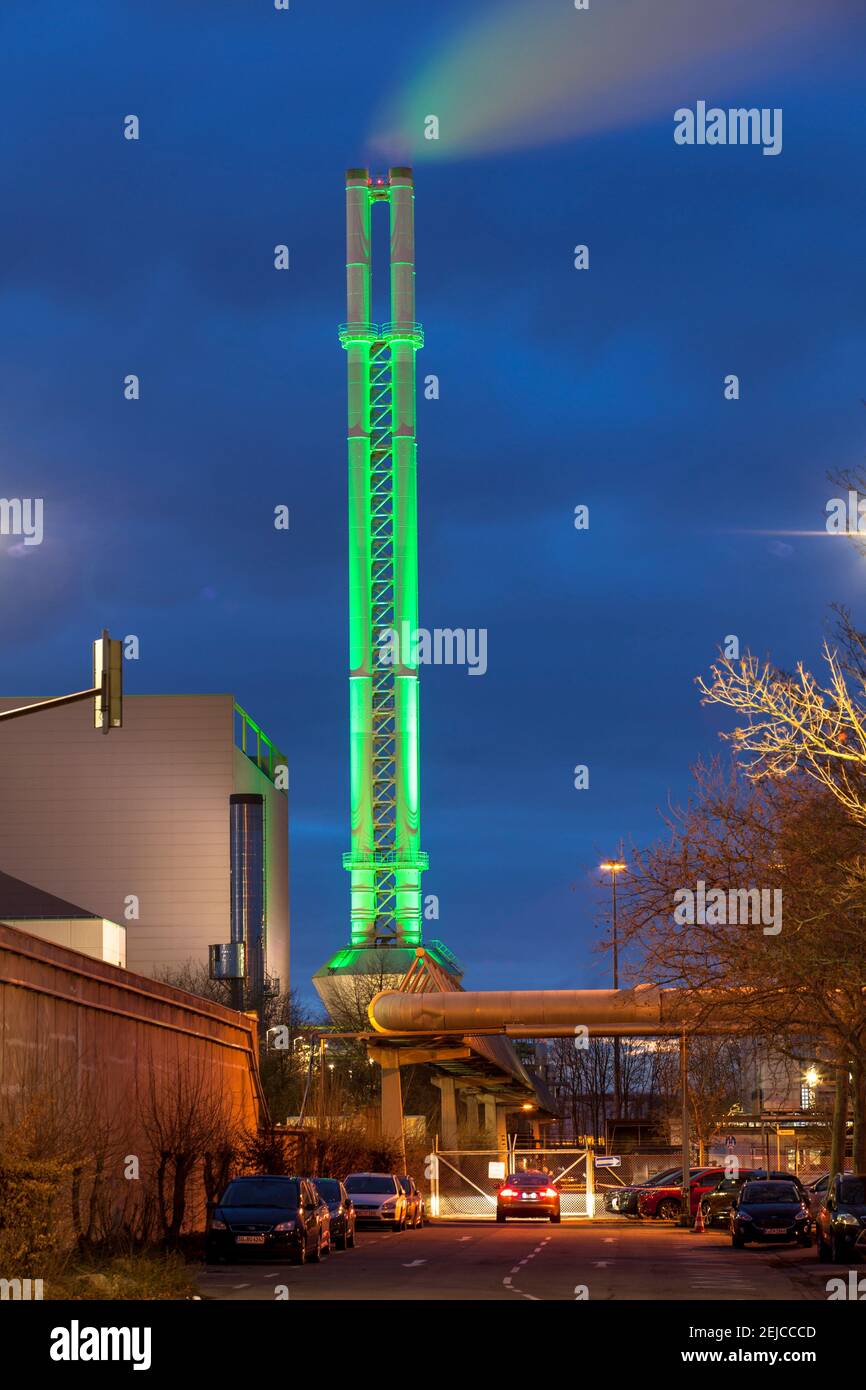 illuminated chimney of the waste incineration plant in Cologne-Niehl, Cologne, Germany.  beleuchteter Schornstein der Muellverbrennungsanlage in Koeln Stock Photo