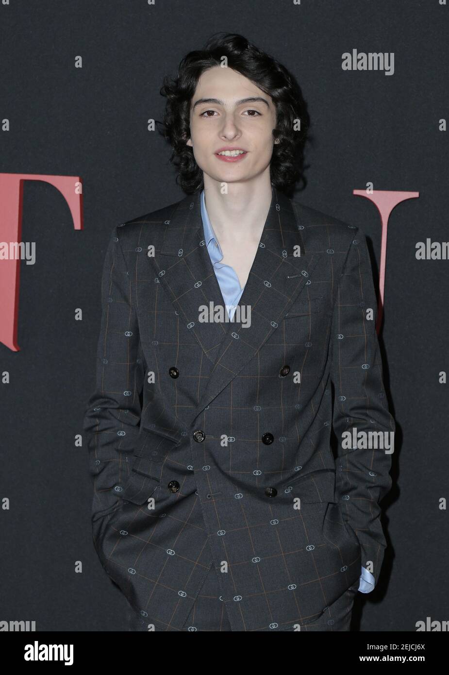 Finn Wolfhard walking the red carpet at the Premiere of Universal ...