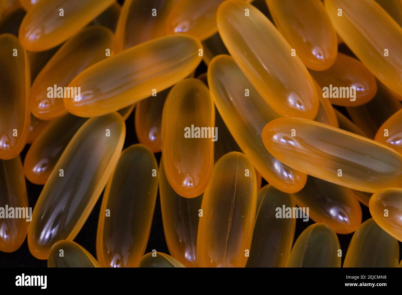 pile of omega 3 and vitamin d capsules background Stock Photo Alamy