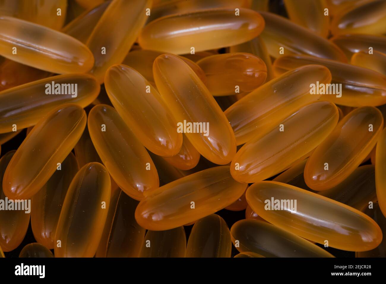 pile of omega 3 and vitamin d capsules background Stock Photo Alamy