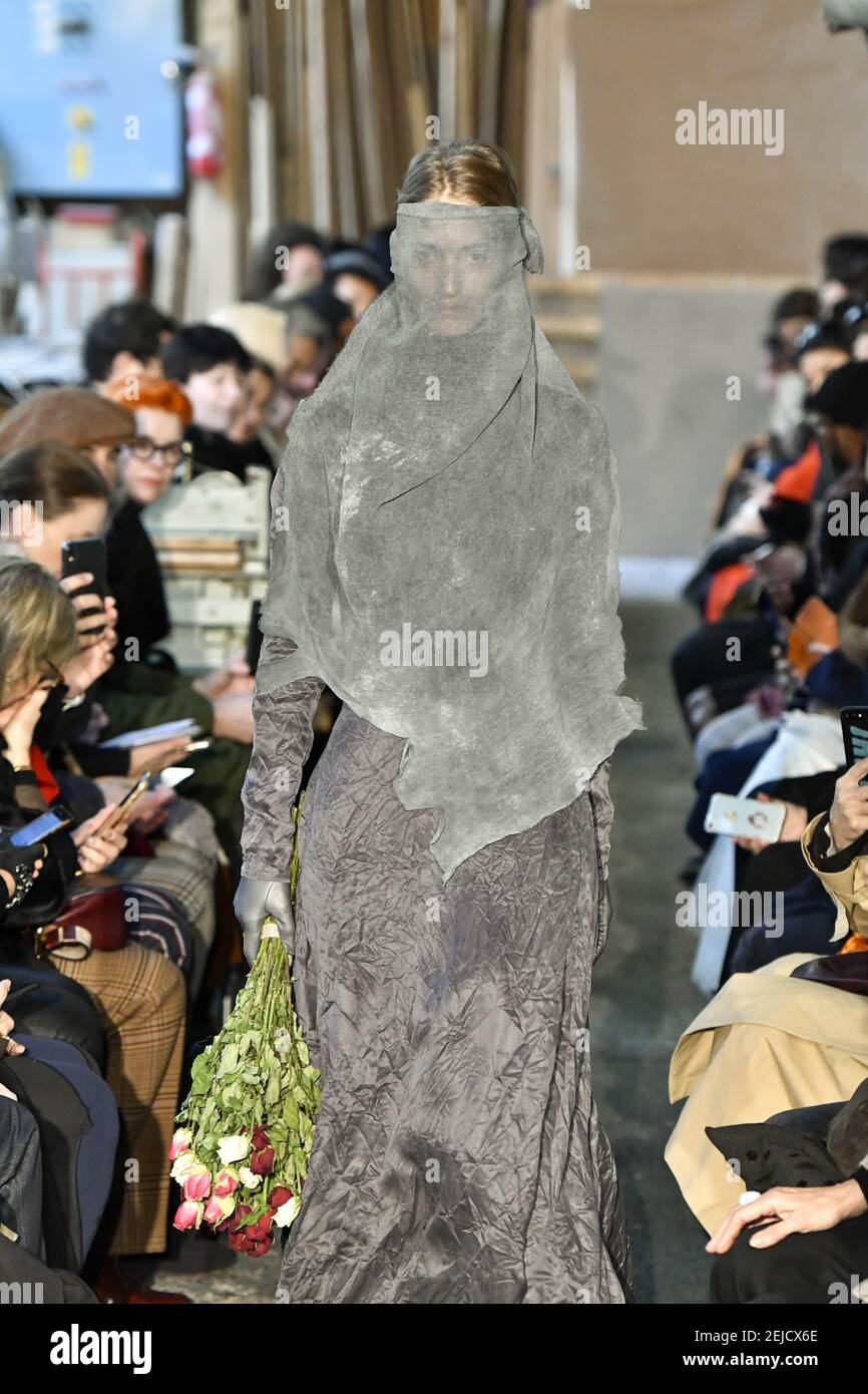 Model walks on the runway during the Aganovich Haute Couture fashion ...