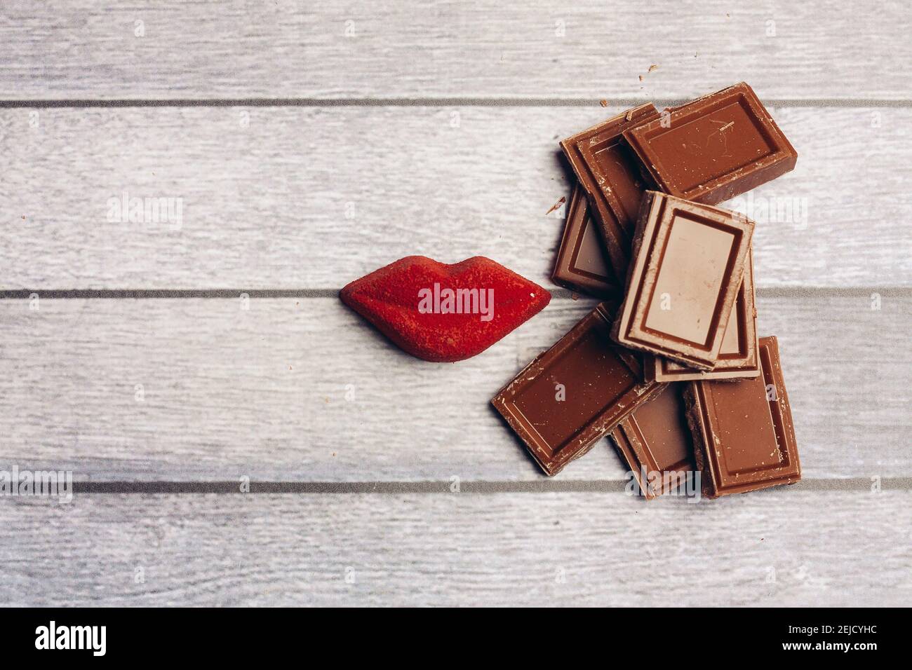 chocolate bar red lips marmalade sweets dessert top view Stock Photo