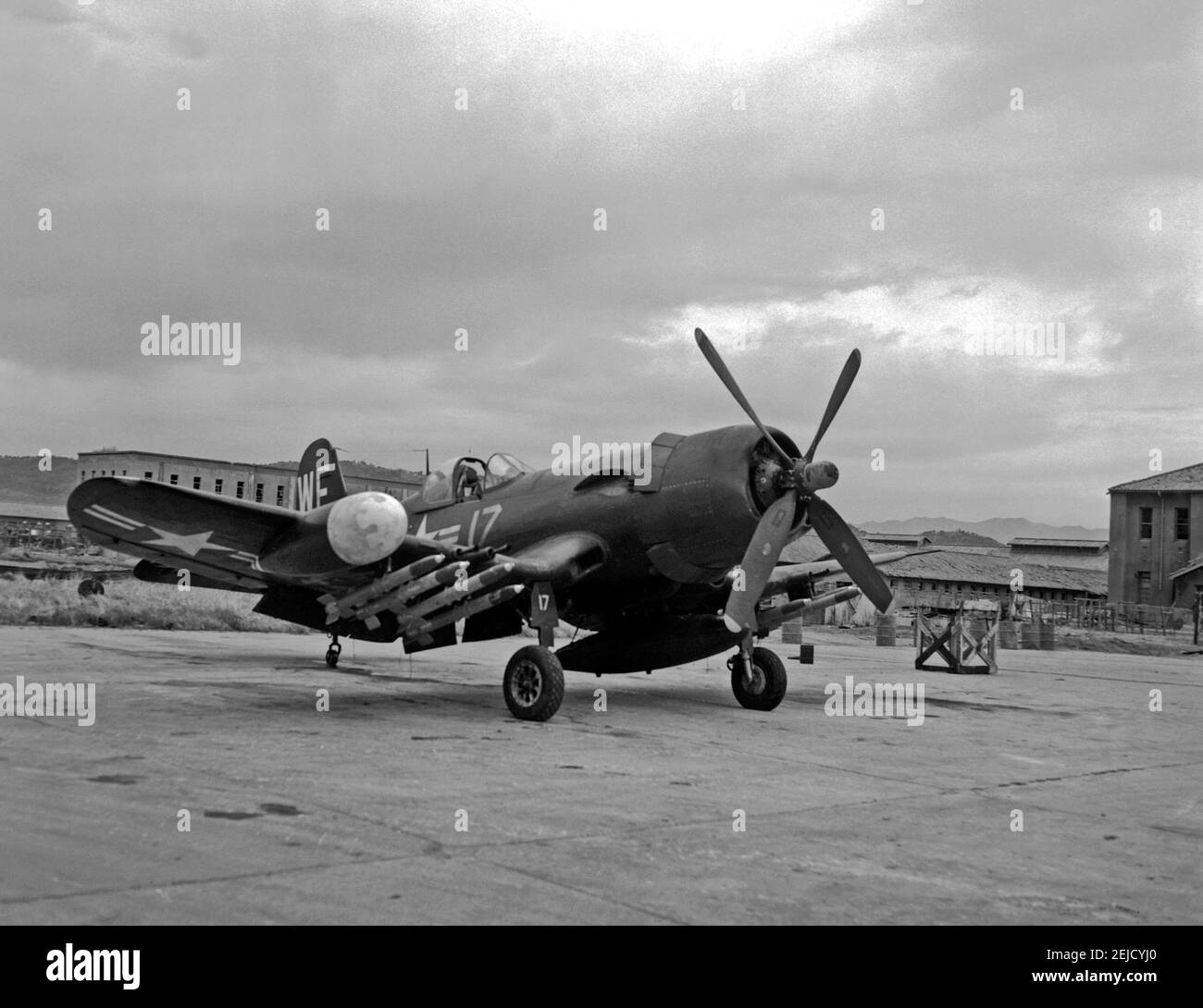 A U.S. Marine Corps Vought F4U-5N Corsair night fighter of Marine night fighter squadron VMF(N)-513 Flying Nightmares on the flight line at Wonsan, Korea, on 2 November 1950 Stock Photo