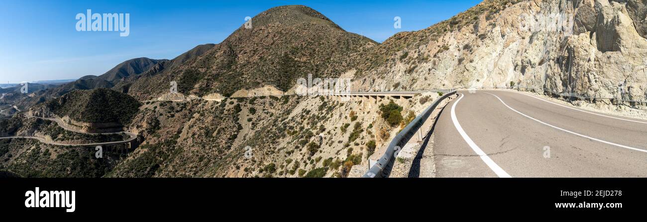 Panorama view of a scenic winding mountain road on the Costa de Almeria in southern Spain Stock Photo