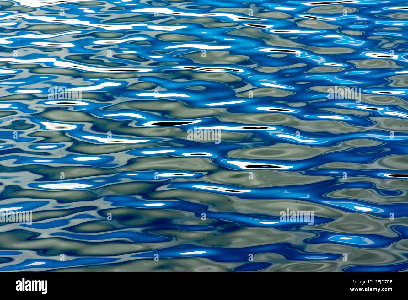 Patterns reflected on a water surface Stock Photo