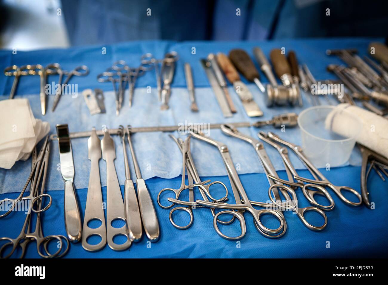 Table of surgical instruments for orthopedics in an operating theater. Stock Photo