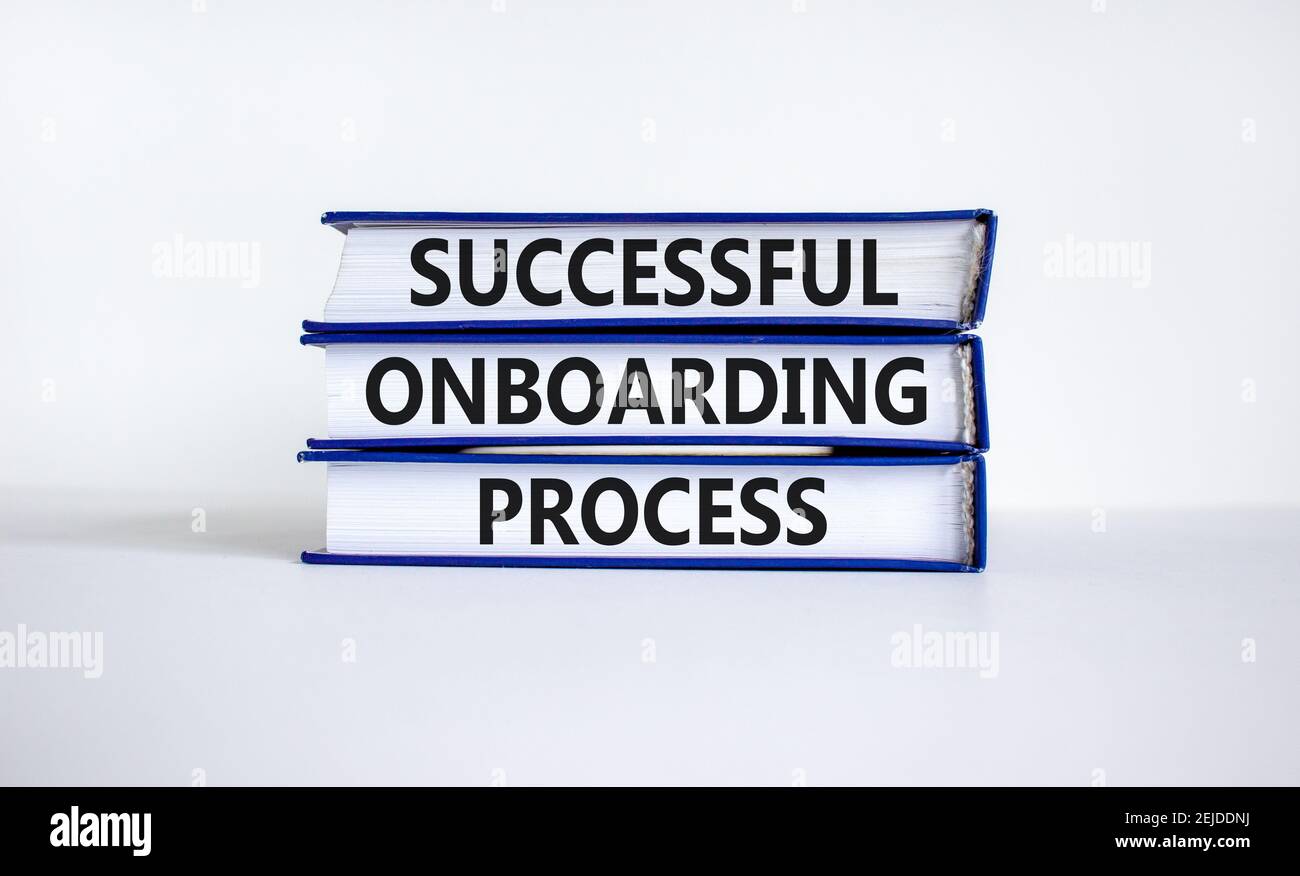 Successful onboarding process symbol. Books with words 'Successful onboarding process' on