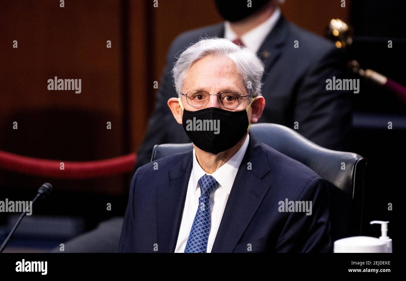 Merrick Garland, nominee to be Attorney General, listens to introductions during his confirmation hearing in the Senate Judicary Committee, Washington, DC, U.S., February 22, 2021.  Bill Clark/Pool via REUTERS Stock Photo