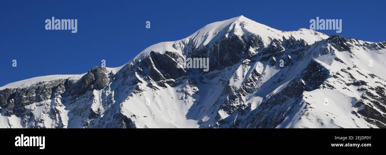 Mountains Piz Segnas and Piz Sardona in winter. View from Elm. Stock Photo