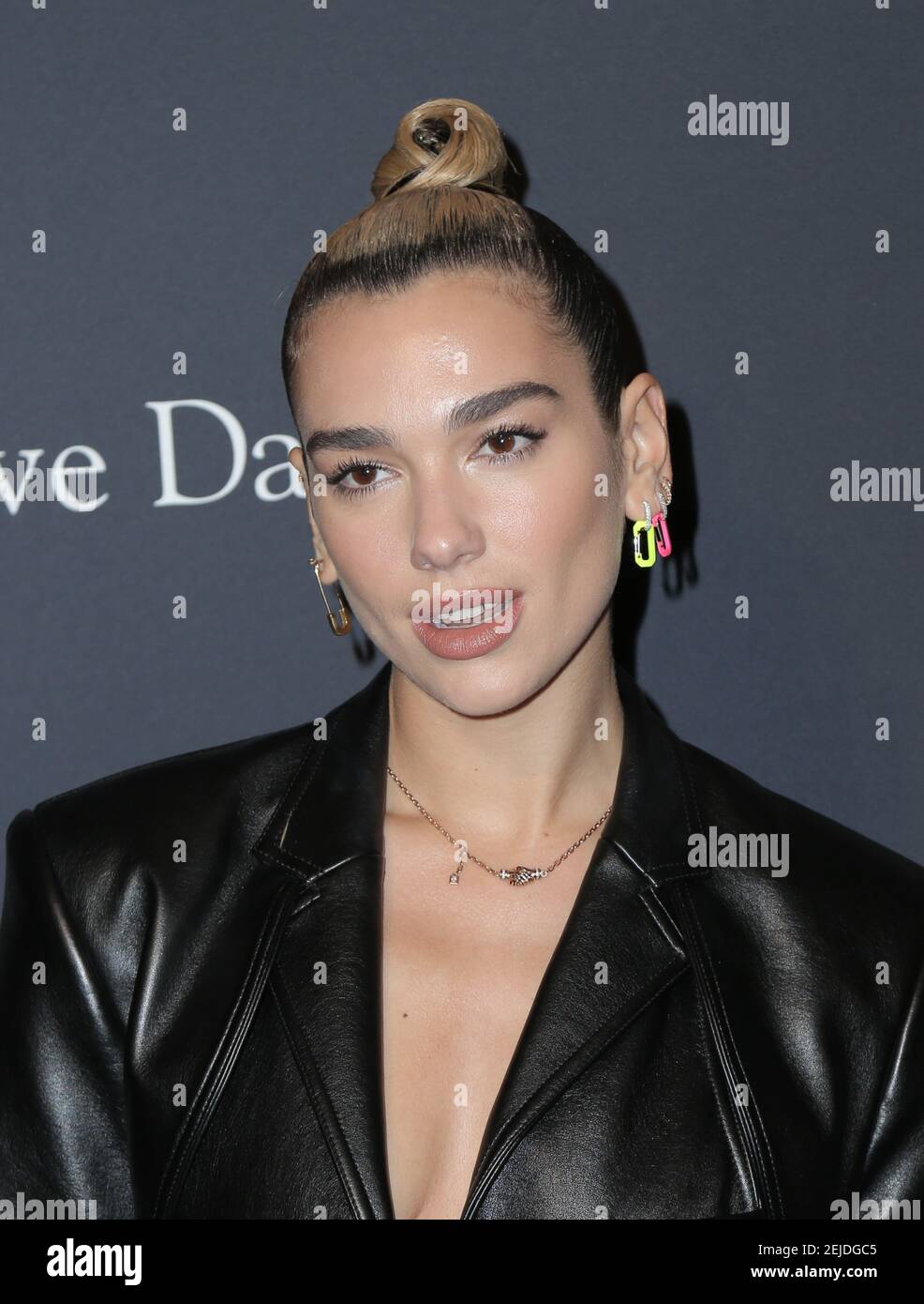 Dua Lipa walking the red carpet at the Clive Davis' 2020 Pre-Grammy