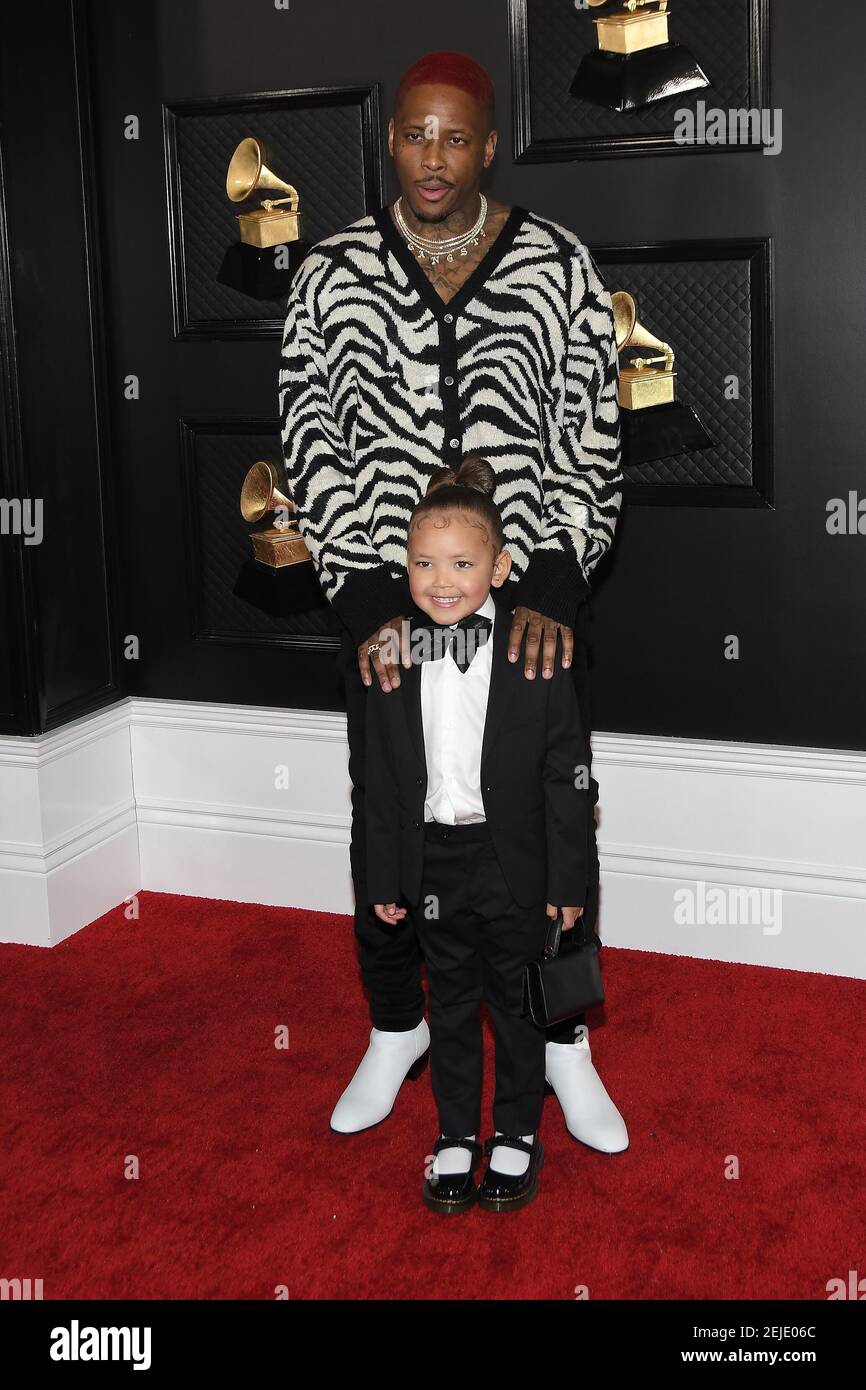 YG, Harmony Jackson arrive at the 62nd Annual Grammy Awards red carpet