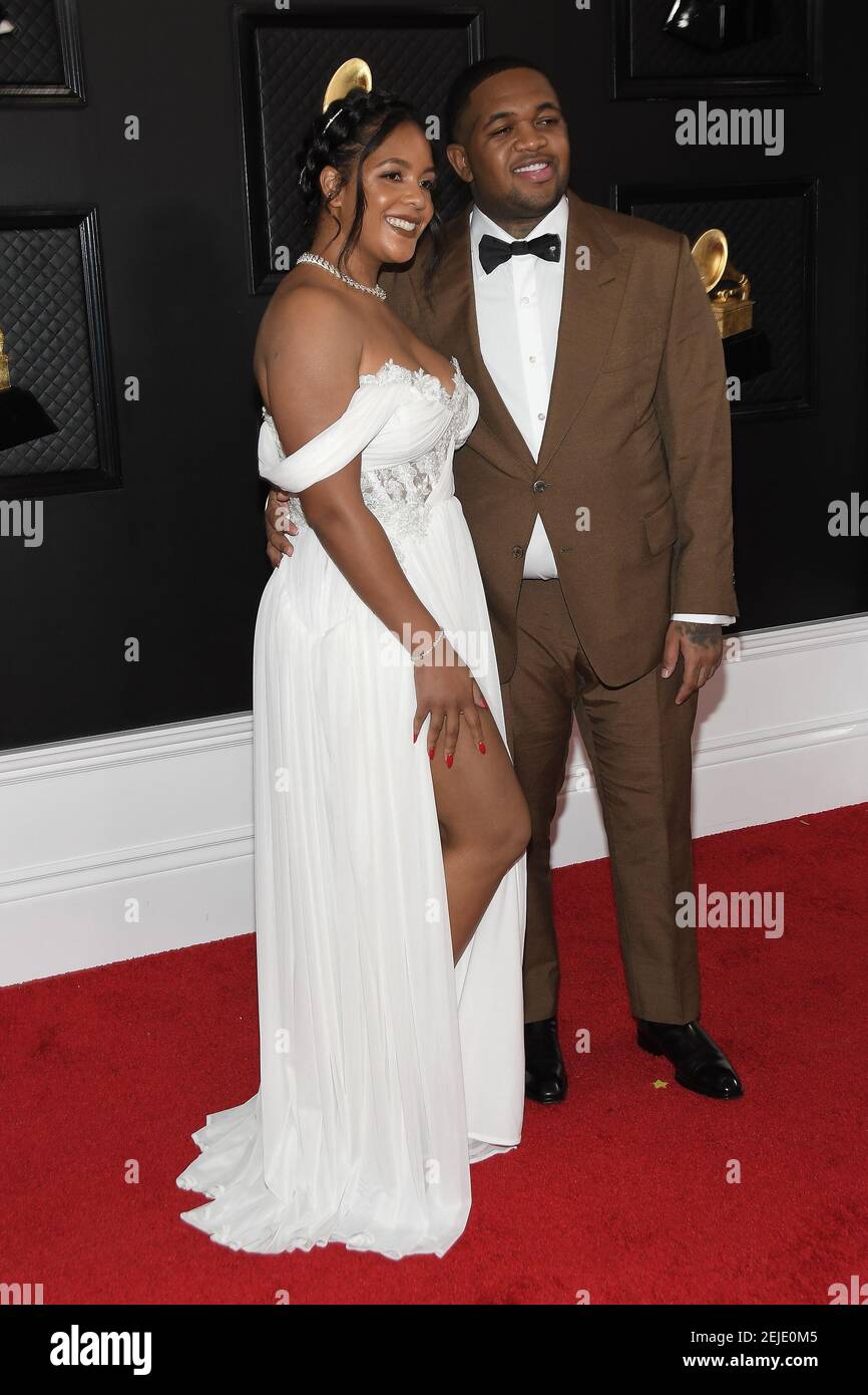 Chanel Thierry, DJ Mustard arrive at the 62nd Annual Grammy Awards red