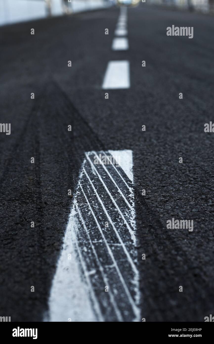 Skid marks tire marks on motor race track asphalt Stock Photo