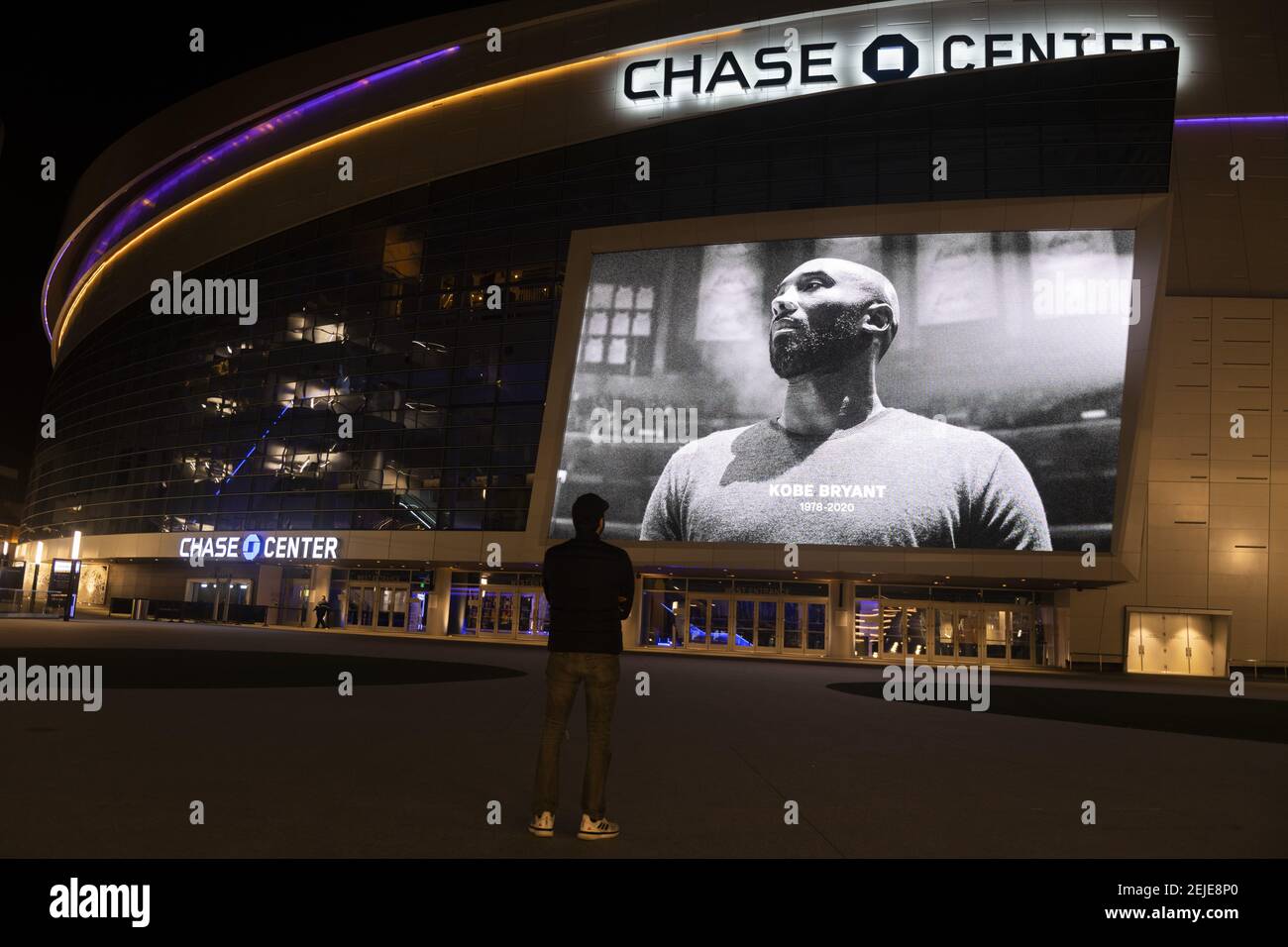 People gather quietly in front of a large image of former Los Angeles basketball player Kobe Bryant at Chase Center in San Francisco, California, United States on January 27, 2020 to pay tribute the legendary sportsman. The world famous NBA player was killed in a helicopter accident on January 26, 2020 when his private Sikorsky S-76B helicopter crashed into a mountain in Calasabas, California and killed 9 people, including his daughter Gigi Bryant. (Photo by Yichuan Cao/Sipa USA) Stock Photo