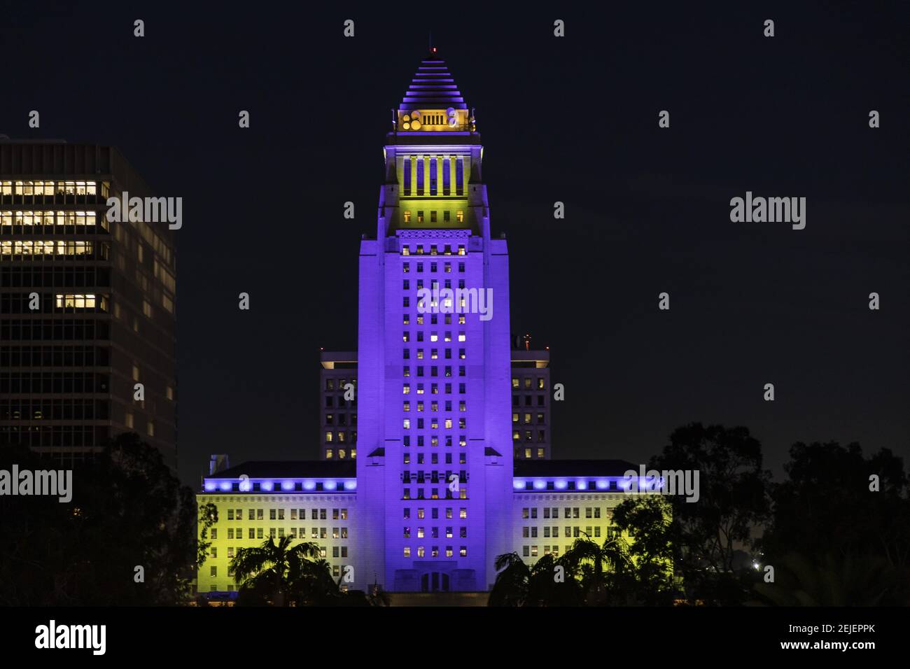 Landmarks and buildings light up in purple and gold, the official Laker ...