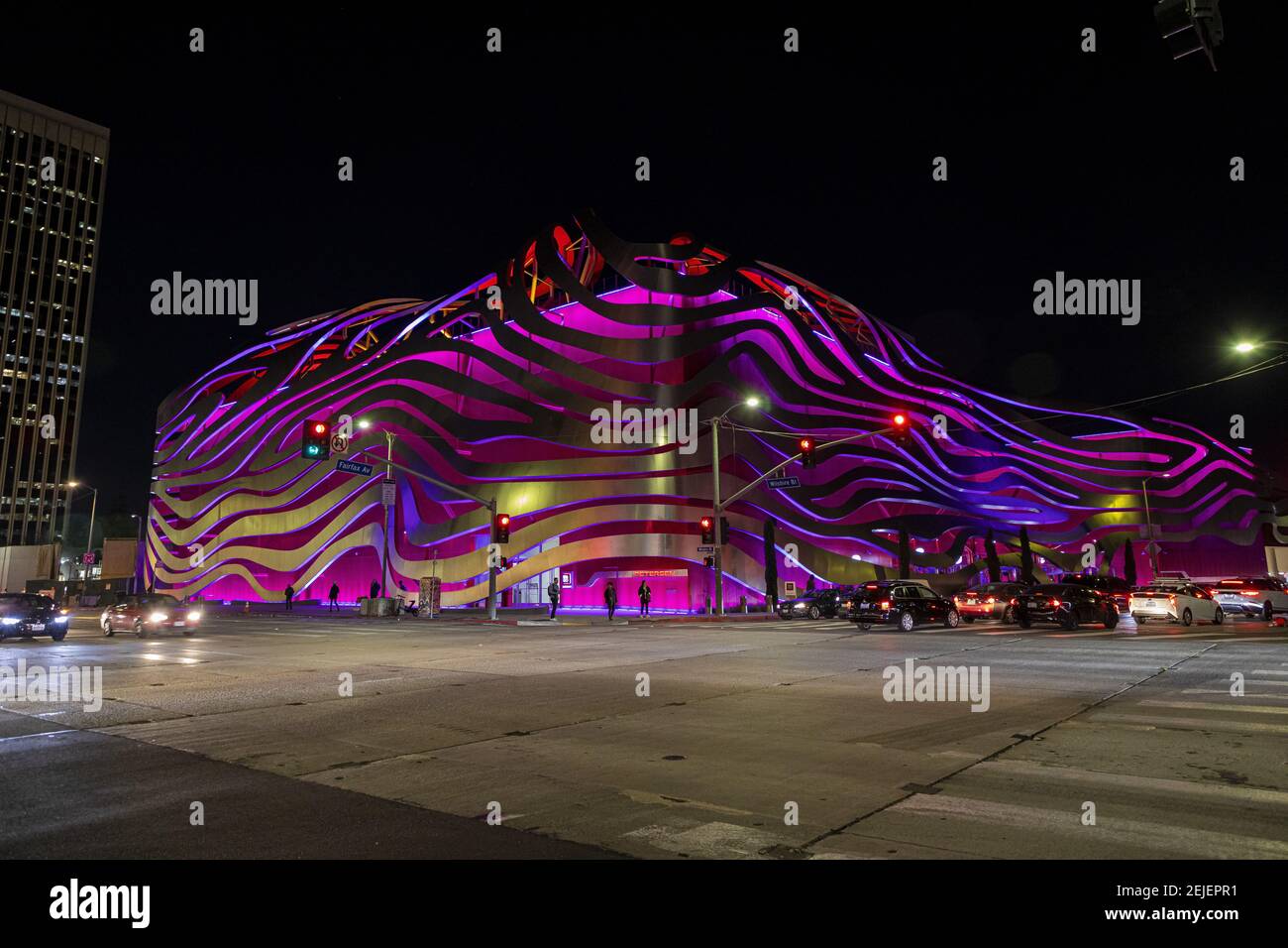Landmarks and buildings light up in purple and gold, the official Laker ...