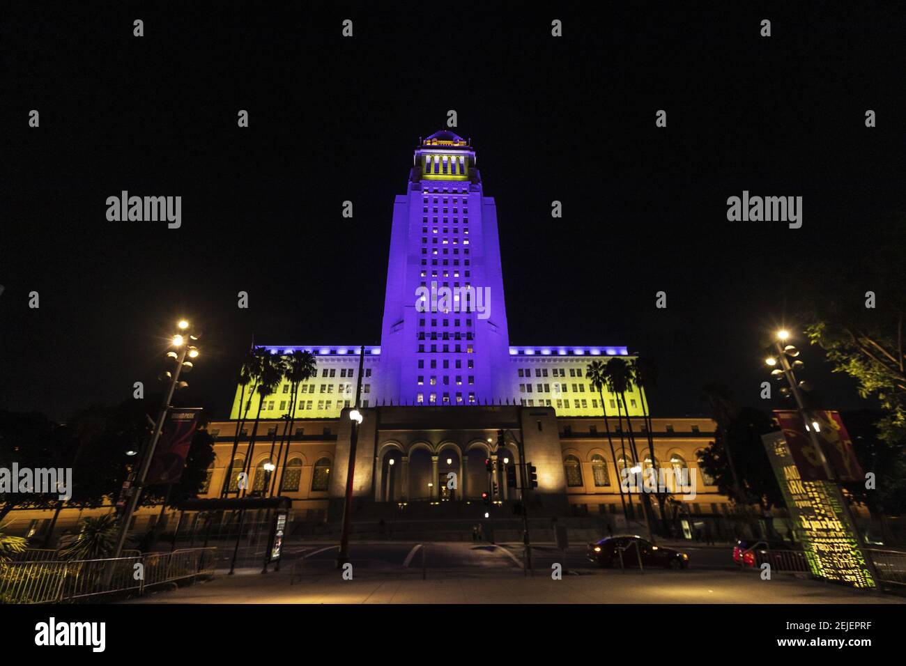 Landmarks and buildings light up in purple and gold, the official Laker ...