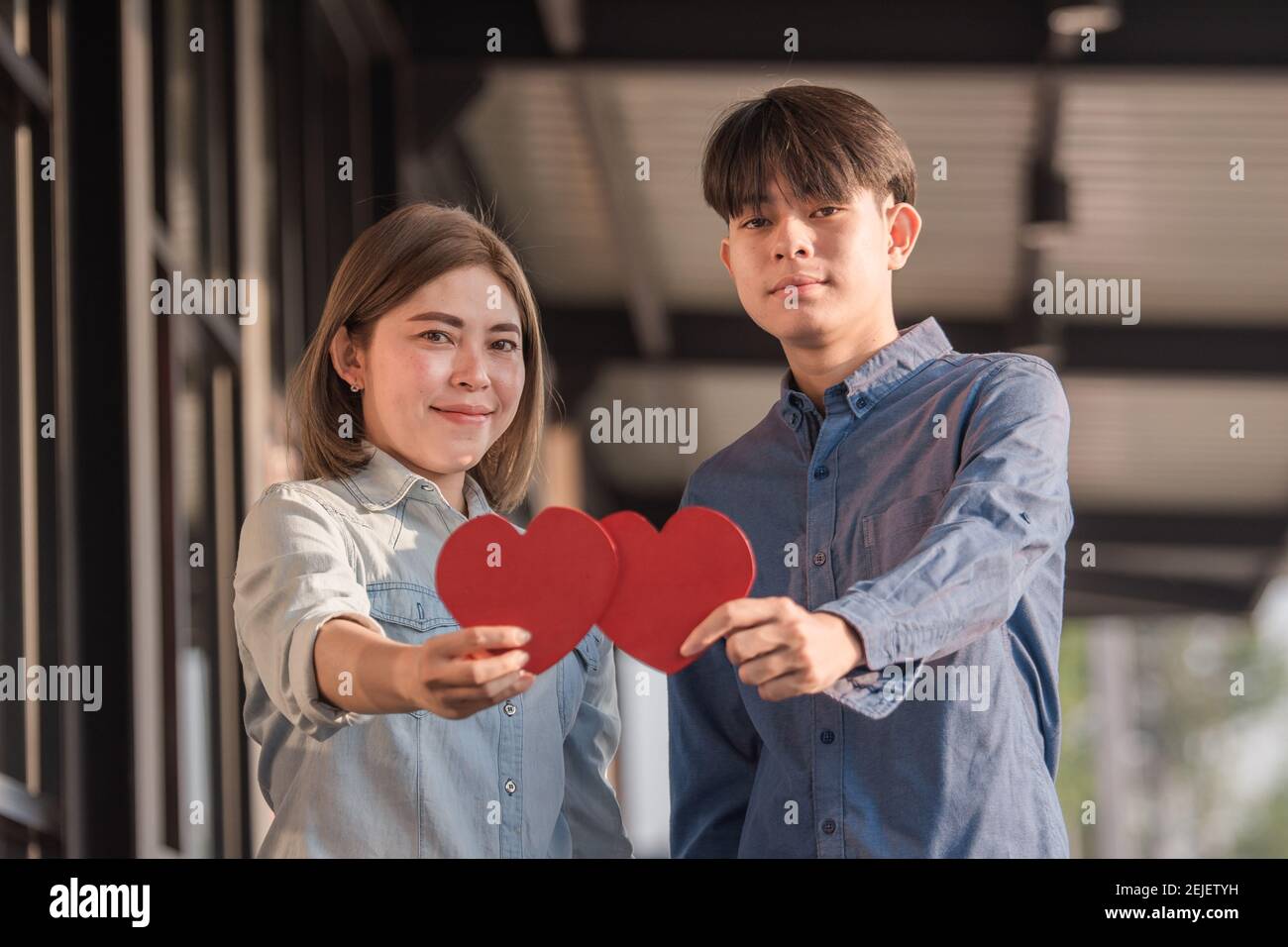 Asian couple holding red heart ,People happy sweet love Valentine ...