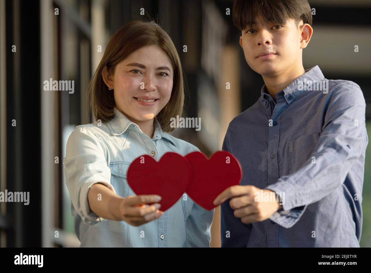 Asian couple holding red heart ,People happy sweet love Valentine ...