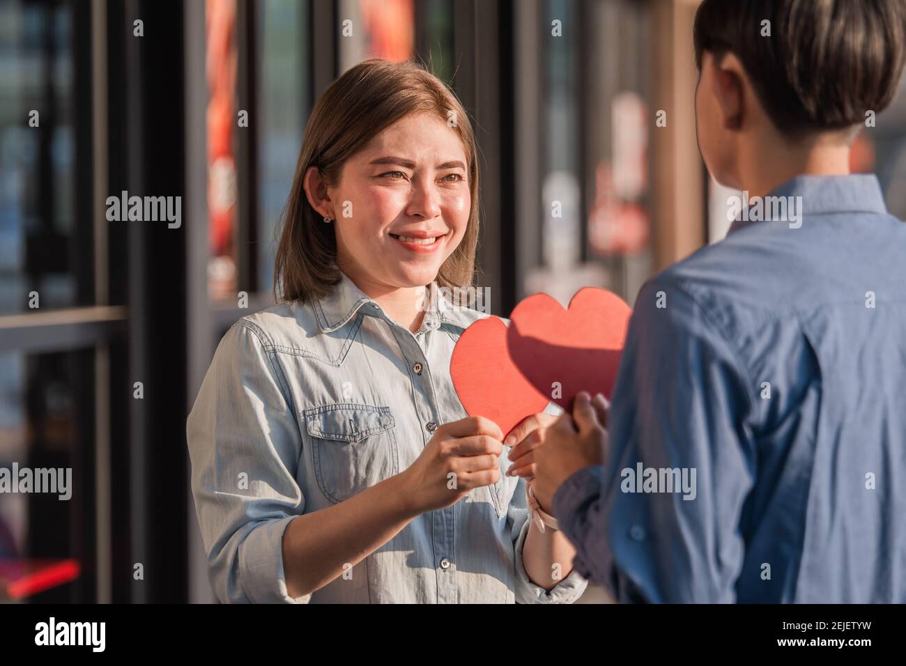 Asian couple holding red heart ,People happy sweet love Valentine ...