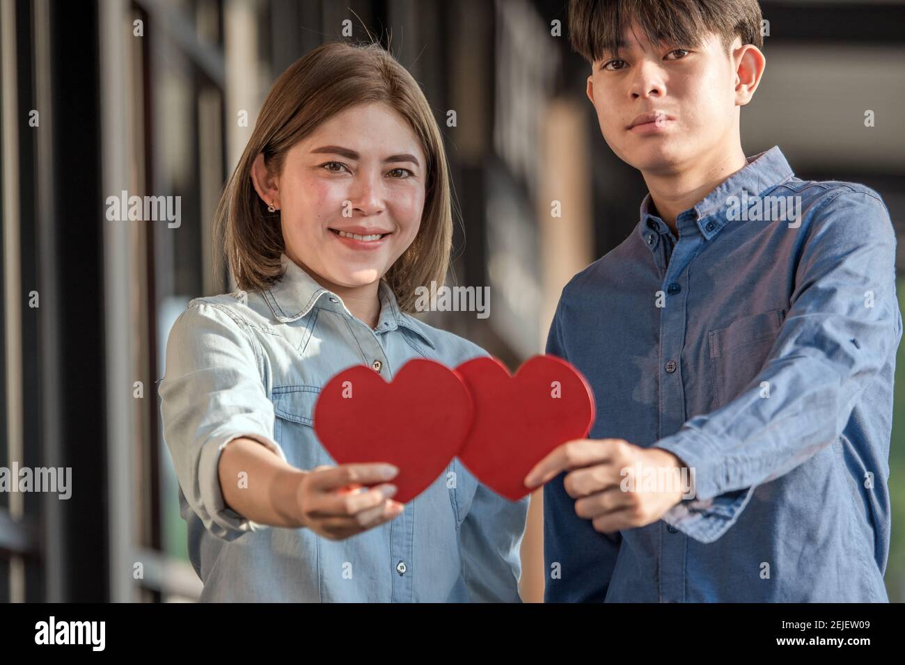 Asian couple holding red heart ,People happy sweet love Valentine ...
