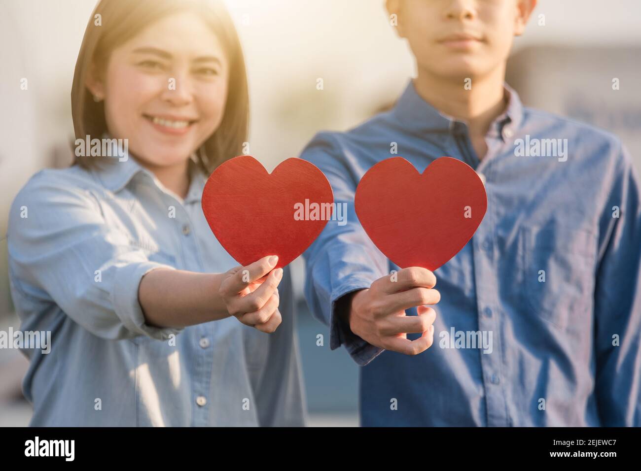 Asian couple holding red heart ,People happy sweet love Valentine ...