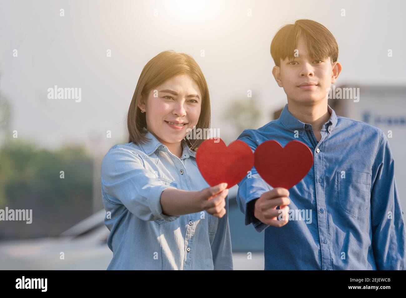 Asian couple holding red heart ,People happy sweet love Valentine ...
