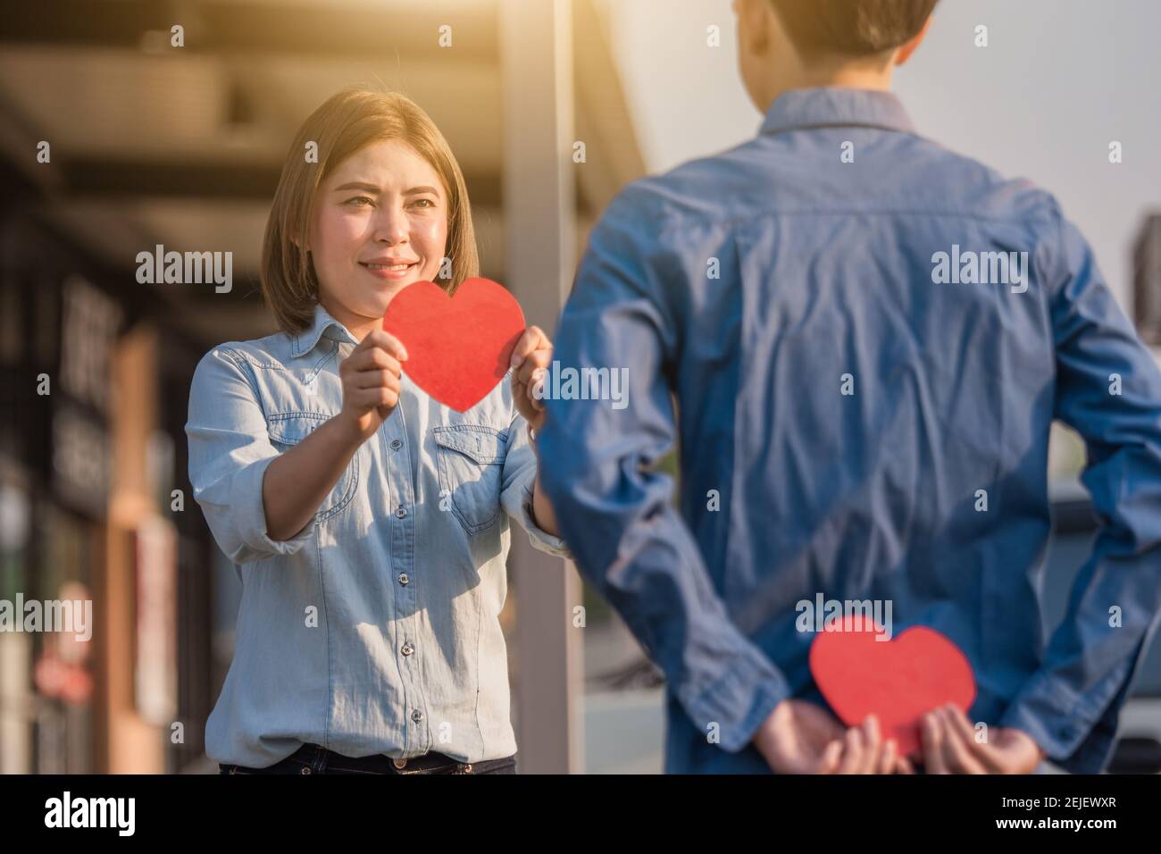 Asian couple holding red heart ,People happy sweet love Valentine ...
