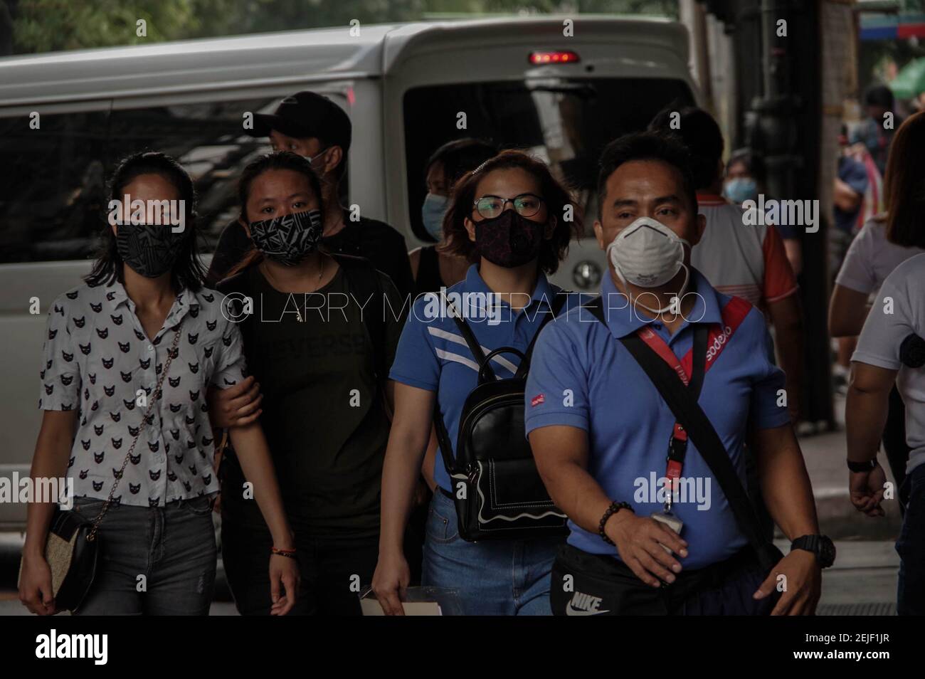 Pedestrians on surgical face masks as precautionary safety against nCoV