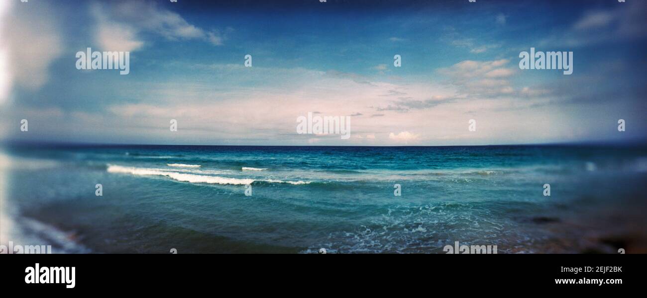 Scenic view of beach against cloudy sky, Santa Maria Del Mar Beach, Havana, Cuba, Stock Photo