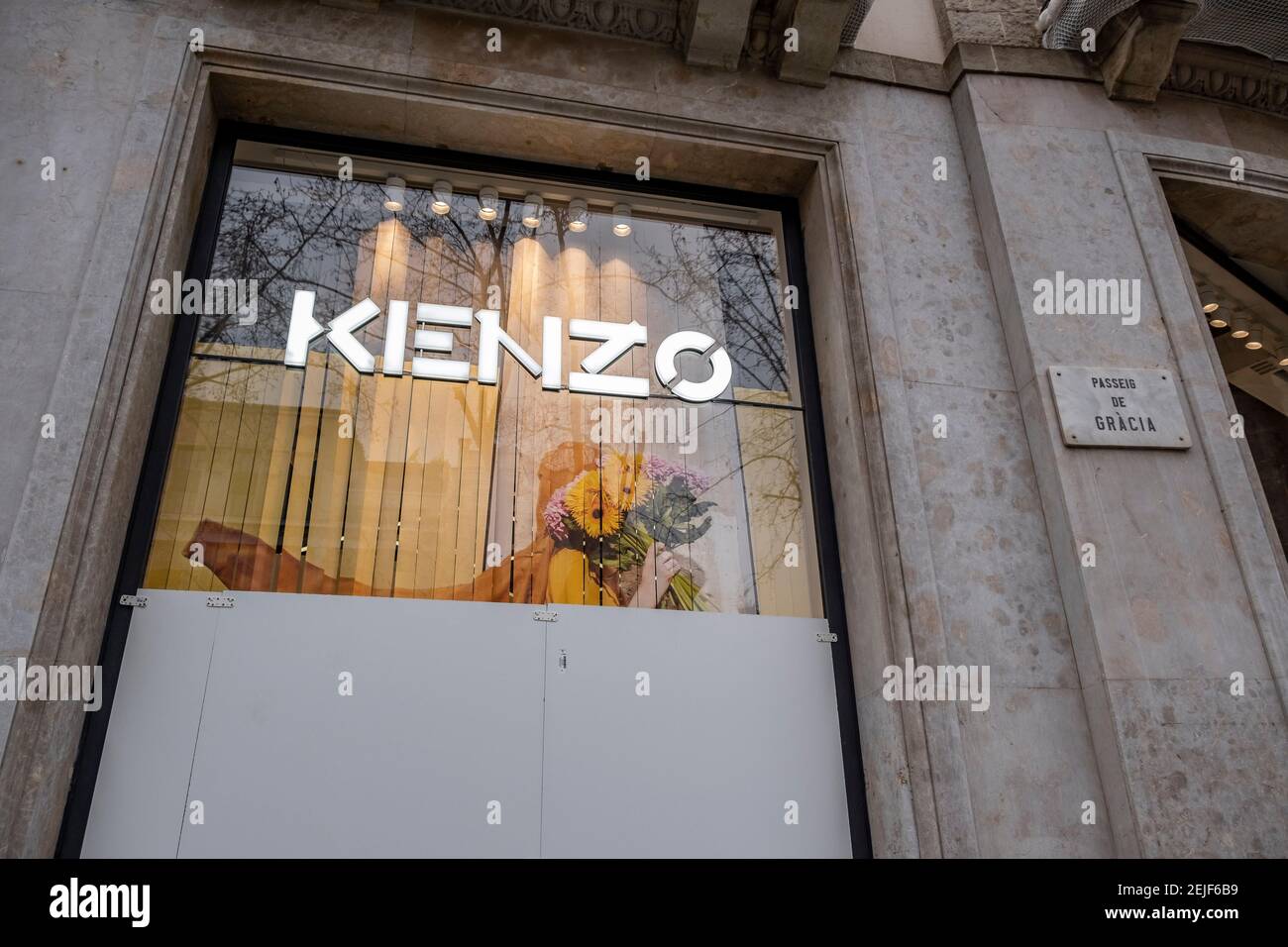 Barcelona, Spain. 22nd Feb, 2021. The Kenzo store on Passeig de Gràcia is  seen with anti-vandalism protections on its windows.More than 50 stores  have suffered damage to their shop windows and some