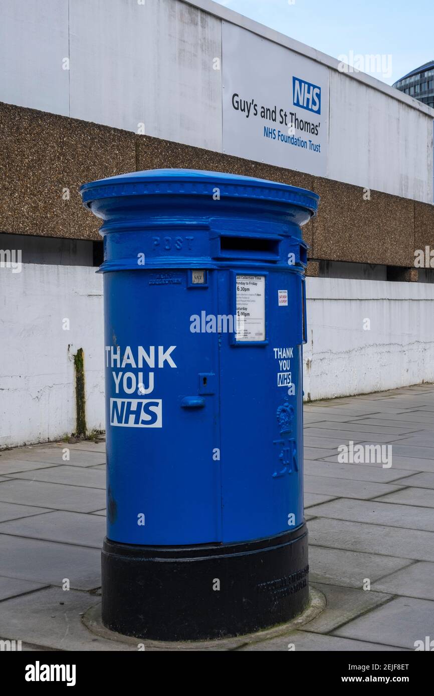 Blue painted Royal Mail post boxes outside St Thomas' Hospital, on the South Bank, near Waterloo, during the Coronavirus pandemic in the UK Stock Photo