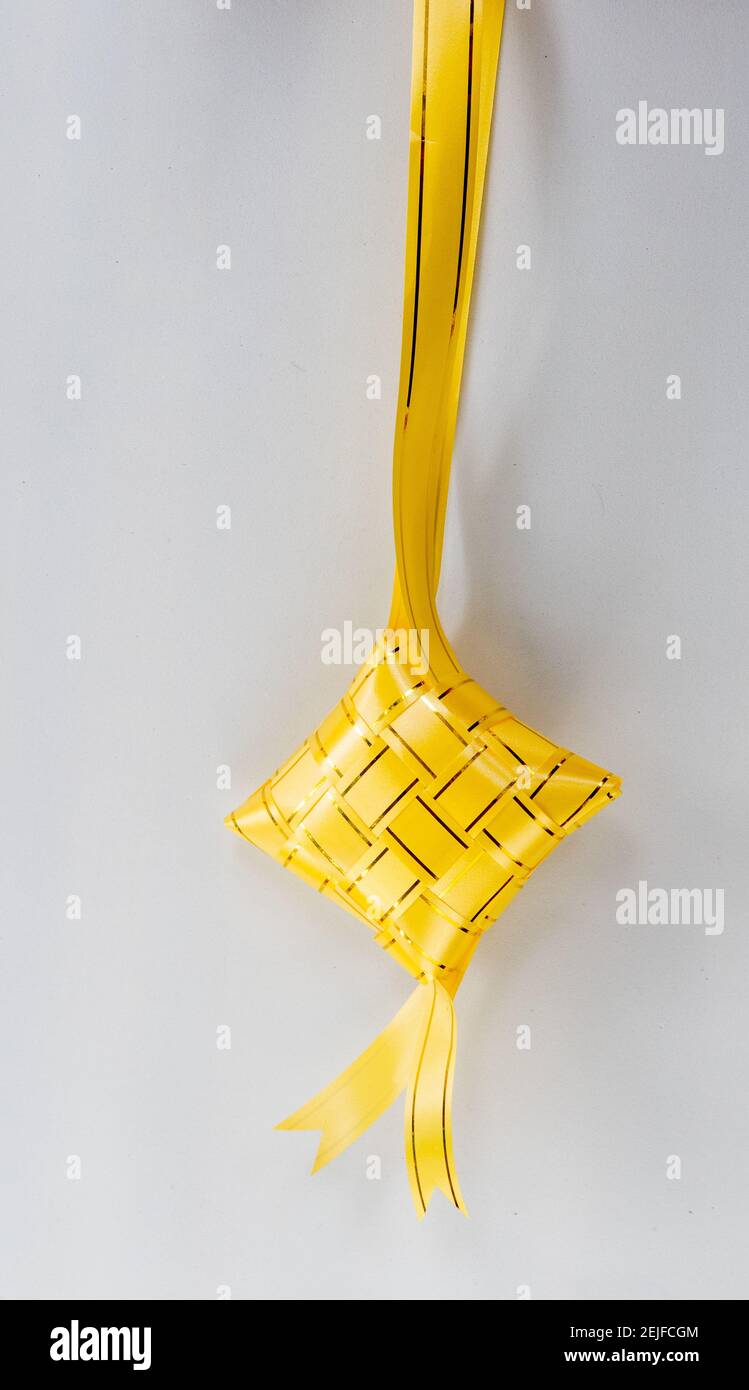 The beutiful gold colors ribbon of ketupat raya Stock Photo - Alamy