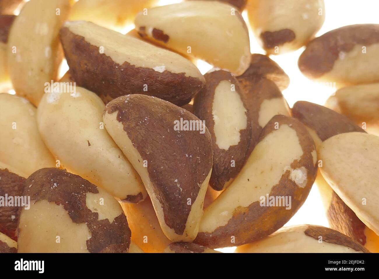 Brazil nut close-up on white background.Healthy fats. Nuts and seeds. A healthy snack. Healthy fats and proteins. Vegetarian Food Ingredient Stock Photo