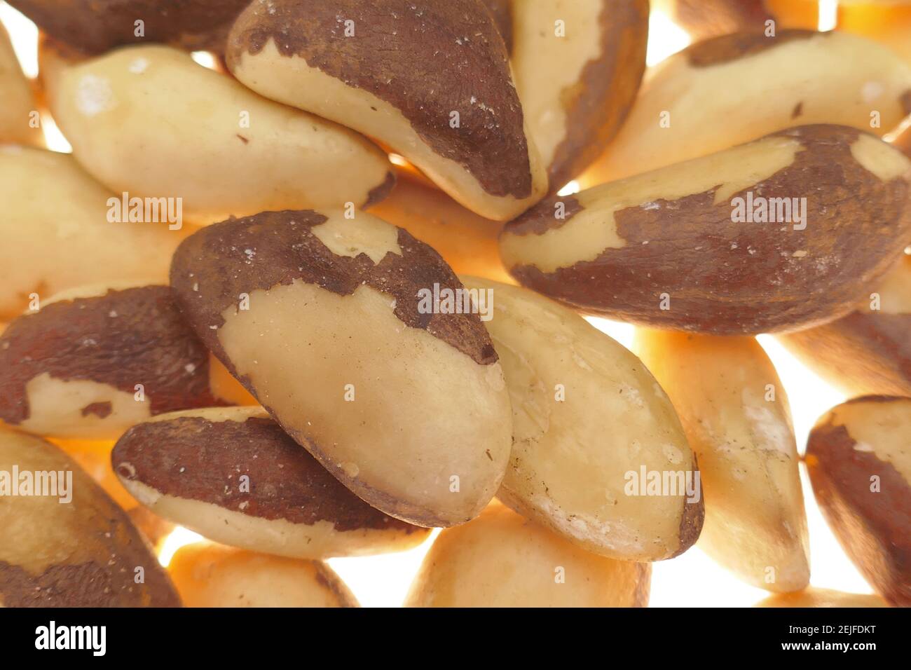 Brazil nut close-up on white background.Healthy fats. Nuts and seeds. A healthy snack. Healthy fats and proteins. Vegan Vegetarian Food  Stock Photo